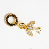 Elegant 6K gold filled airplane charm from INDIVIJWL, adorned with micro paved cubic zirconia and a removable, interchangeable bail holder. Ideal for creating customizable travel-inspired necklaces and bracelets.