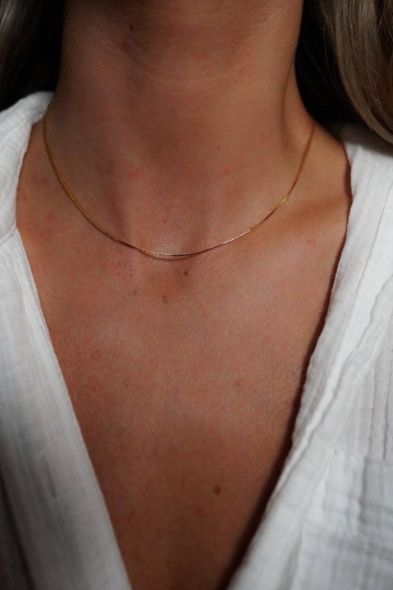 Elegant 16-inch dainty gold box chain necklace in 24k gold-filled by INDIVIJWL, shown on a model for a minimalist and timeless jewelry aesthetic.