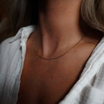 Model wearing INDIVIJWL 16-inch dainty gold box chain necklace, featuring a delicate 24k gold-filled design. Perfect for a minimalist, elegant jewelry style.