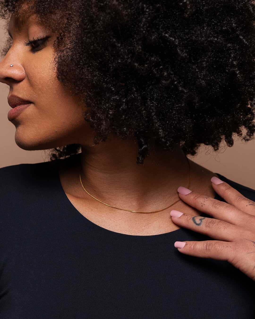 Close-up of 16-inch dainty gold box chain necklace by INDIVIJWL, crafted with 24k gold-filled material for a subtle, everyday luxury look.