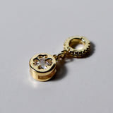 INDIVIJWL 24k gold-filled four-leaf clover charm adorned with clear cubic zirconia gems, featuring a 16k gold-filled removable and interchangeable bail clasp for customizable jewelry.