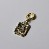 Luxurious 14k gold-filled club pendant charm by INDIVIJWL, crafted with intricate detailing and a cubic zirconia accent, paired with a 16k gold-filled removable bail. A statement of uniqueness and personal style.